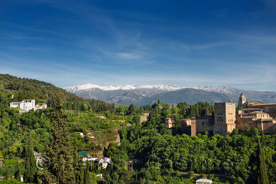 Snow capped Sierra Nevada Mountains between Generalife and Alhambra Fortress Granada