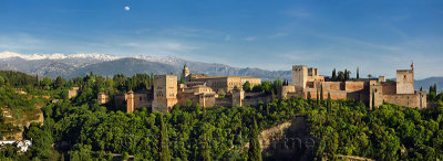 Panorama of snow on Sierra Nevada Mountains and Alhambra Palace fortress Granada