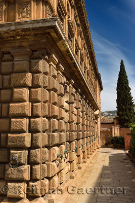 Lower rustication and upper ashlar at east side of the Palace of Charles V at Alhambra in Granada Spain