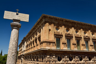 Pillar with latin inscription at church of Saint Mary beside Charles V Palace in Alhambra Granada