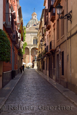 Wide street of Santo Domingo leading to the ancient church and statue of Friar Louis of Granada