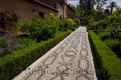Black and white stone patterned garden walkway of San Francisco convent at Alhambra Palace Granada