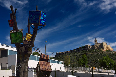 Ancient hilltop Fortress of La Mota with Abbey Church and modern sculpture at hospital in Alcala la Real Spain