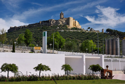 Ancient hilltop Fortress of Mota with Abbey Church and modern hospital in Alcala la Real Spain
