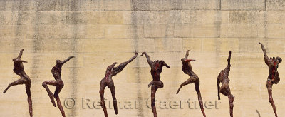 Bloody headless dancers sculpture at Puerta del Puente Gate Bridge square Cordoba Spain