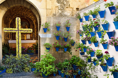 Our lady of Bethlehem and Shepherds Chapel with potted flower courtyard during Spring festival Cordoba