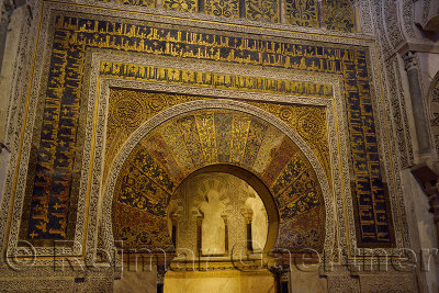 Mihrab with gold mosaic design and caligraphy at the Prayer Hall of the Cordoba Cathedral Mosque