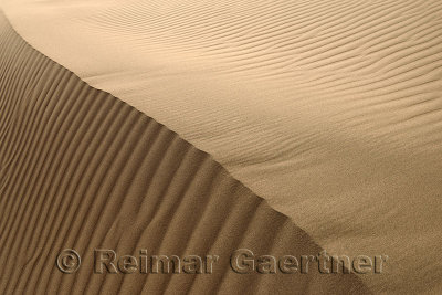 Abstract sand ripples at Singing Sand Dune peak Altyn Emel National Park Kazakhstan