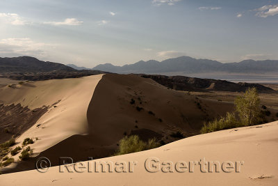 Sundown at Singing Sand Dune Altyn Emel National Park with northern Matthew and western Kalkan mountains