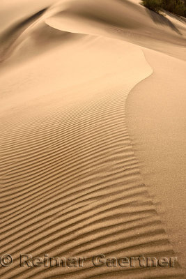 Abstract shapes and ripples at Singing Sand Dune Altyn Emel National Park Kazakhstan