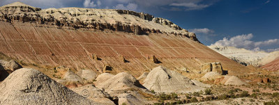 Panorama of white gypsum and red sedimentary layers at Aktau Mountain Altyn Emel National Park Kazakhstan