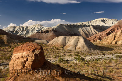 Erosion of red and white sedimentary layers at Aktau Mountains Altyn Emel Park Kazakhstan