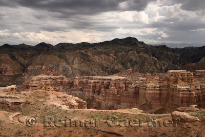 Single tourist on cliff top path of Charyn Canyon National Park Kazakhstan