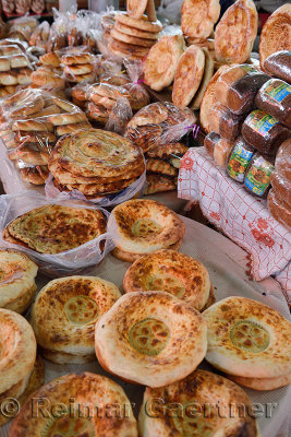 Tables with fresh Kazakh Nan bread in Shymkent Central Market Kazakhstan