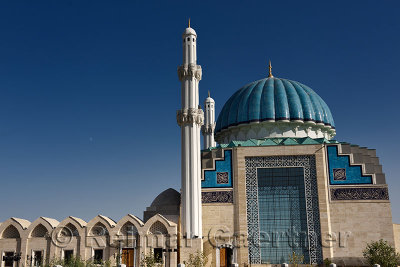 Blue ribbed dome and white minarets of Hoca Ahmet Yesevi Mosque in Turkistan Kazakhstan