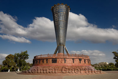 Full view of Altyn Shanyrak monument with large gates to Independence Park in Shymkent Kazakhstan