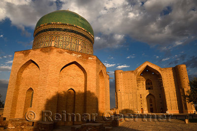 Mausoleums of Rabigha Sultan Begum with dome and Khoja Ahmed Yasawi at dawn in Turkestan Kazakhstan