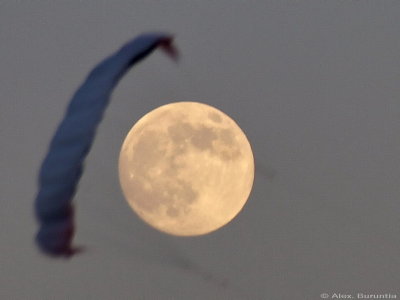 'SuperMoon' rise captured by a kite on the Black Sea summer beach
