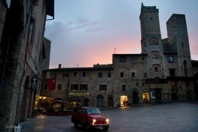 San Gimignano. the red .Fiat 500 