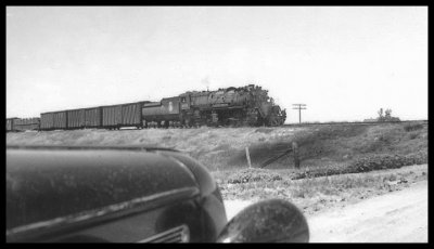Great Northern train approaching Wellsburg, N.D., 1940s.