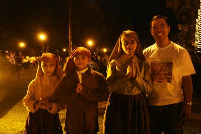 Mons. Bart with the Floro siblings as the child visionaries of Fatima