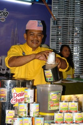 Mixing Malaysian tea with condense milk