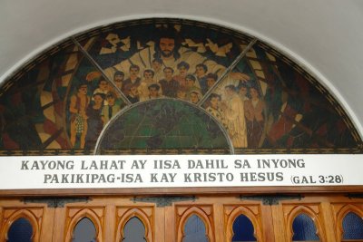 Detail: Stained glass window over main entrance