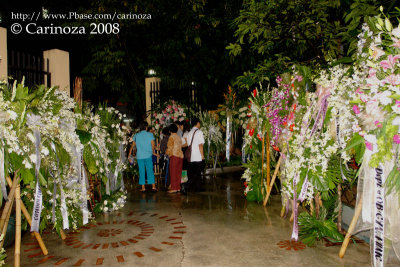 Numerous wreaths line-up the main driveway