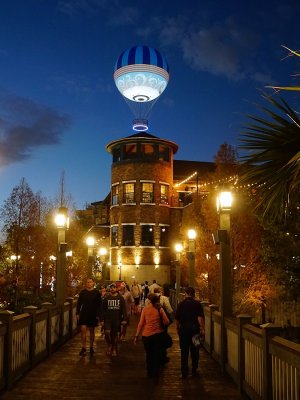 Balloon rising at night over Disney Springs