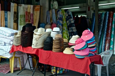 Hats for sale in the commercial area of the Wat complex.