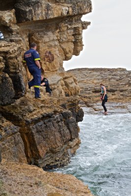 Getting back to the rock ledge involves getting wet feet at this stage of the tide.