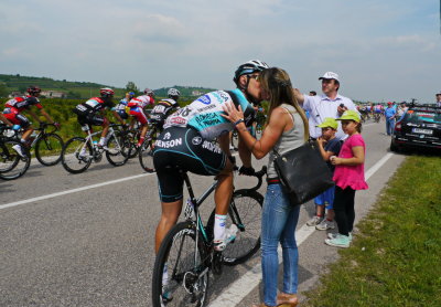 Matteo Trentin of Omega Pharma-Quickstep gets much needed sustenance at feeding station