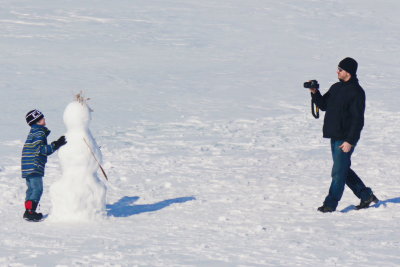 Dad taking a picture of me and my Snowman on Collingwood Harbour - Mar. 7, 2014