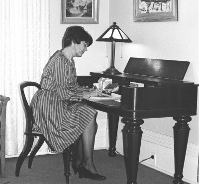 Denise Bristow at desk - 154 Norfolk St. S. Simcoe