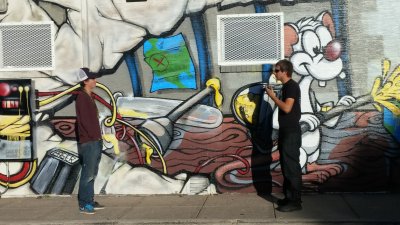 Zach and Kelley in front of the Lions Den dispensary