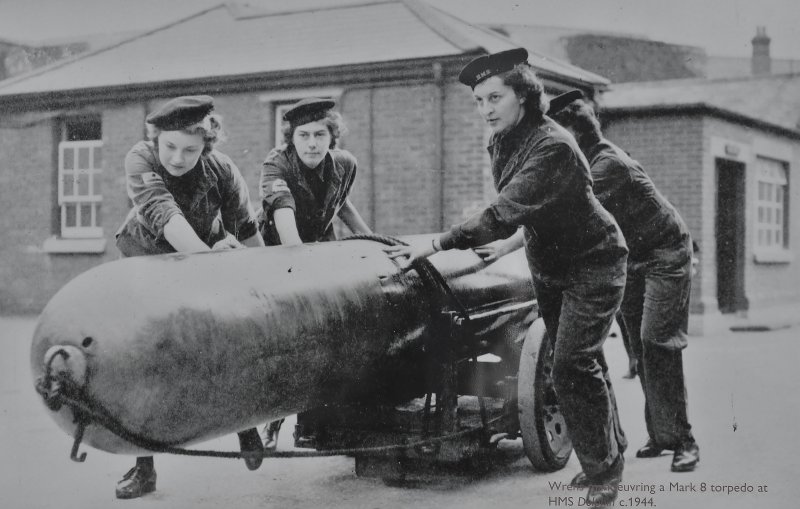Young ladies loading torpedoes in 1944