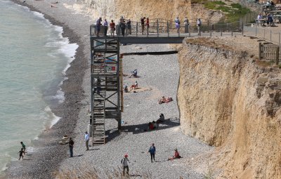 The only way to the beach here is down these steps.