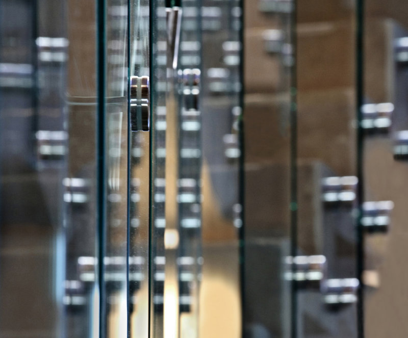 Bolts, Dirty Glass, and Reflections