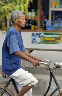 Serious Old Man on Bicycle