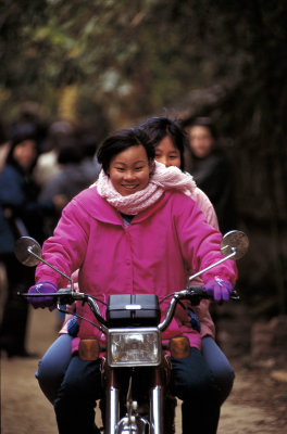 Chinese Girls on a Bike