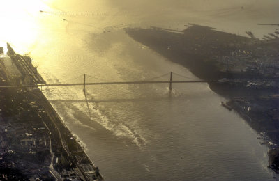 Sunrise Over The Tagus River And Bridge