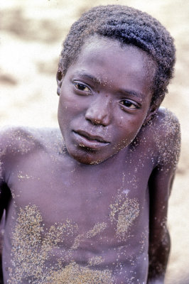 Boy Playing on the Beach With a Typical Sao Tome Face