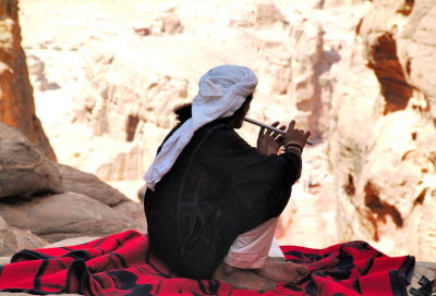 The Lone Flute Player on the Rocks