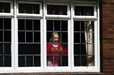Girl at the Bar Window