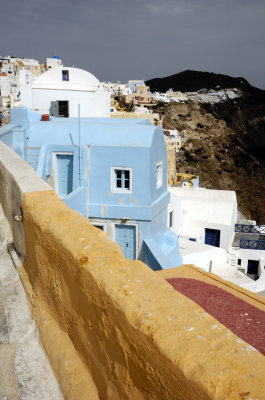 The Wall And The Oia Houses