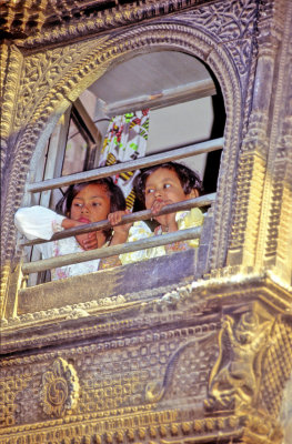 Godess And Sister Peeping From Beautiful Wooden Balcony