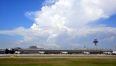 Landing In Singapore Amidst Clouds