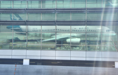Reflection Of Our Plane On Its Home Airport 9V-SLR