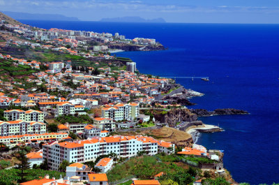 Modern Madeira With Desert Islands In Background