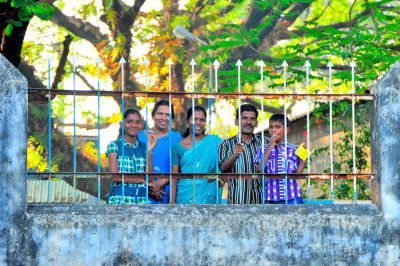 Smilling Family Behind Bars
